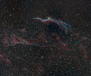The western side of the Cygnus Loop, a supernova remnant.