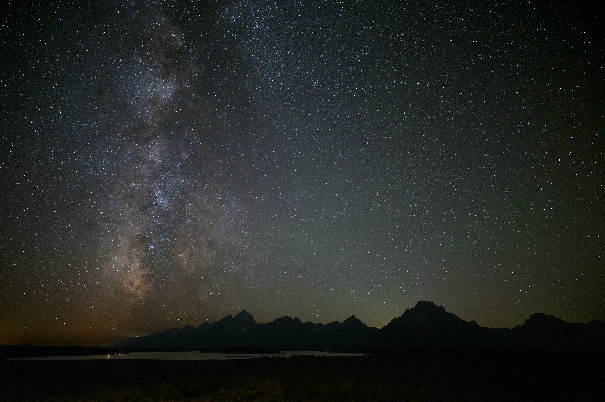 Our home galaxy, the Milky Way, stretching up over the Teton Range and Jackson Lake in Grand Teton National Park